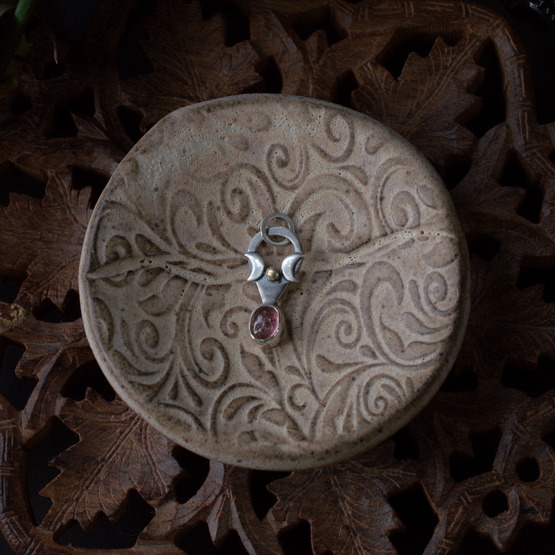 Small sterling silver triple goddess and pink tourmaline charm.