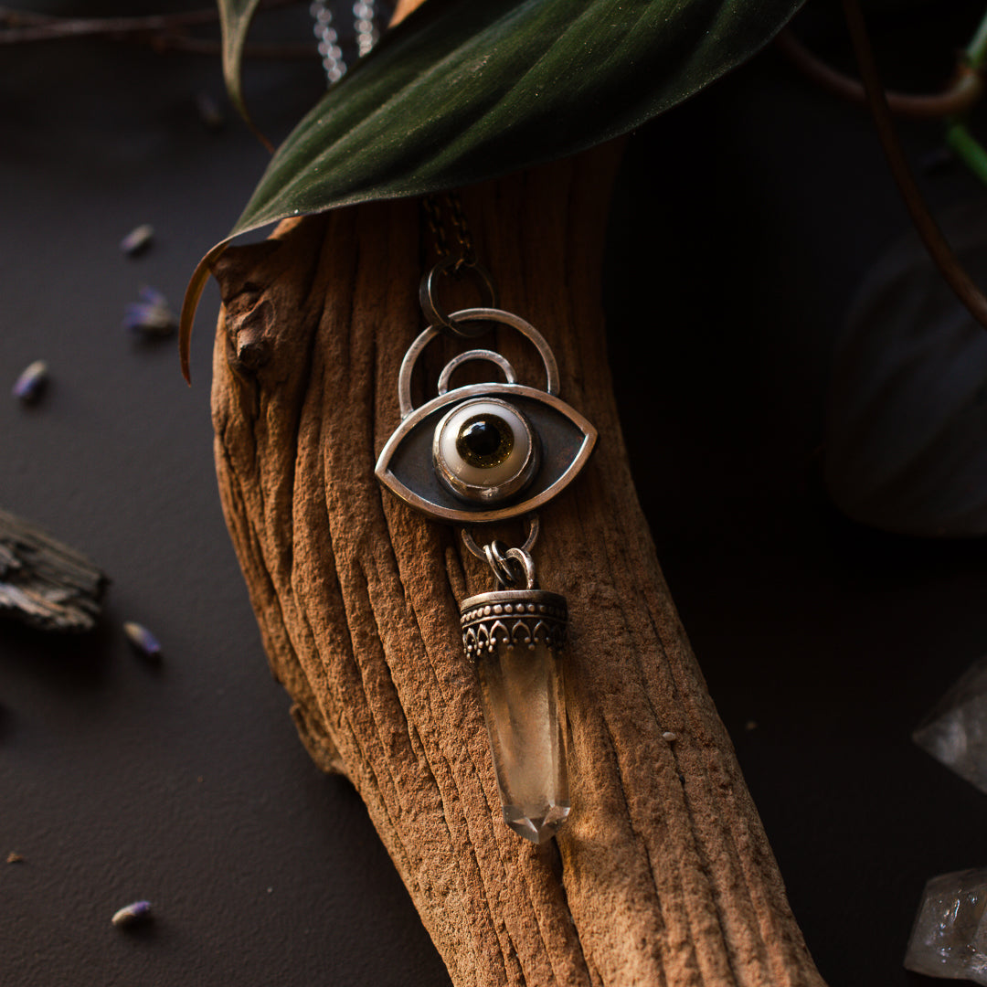 All seeing eye talisman with pahntom quartz point set in sterling silver.