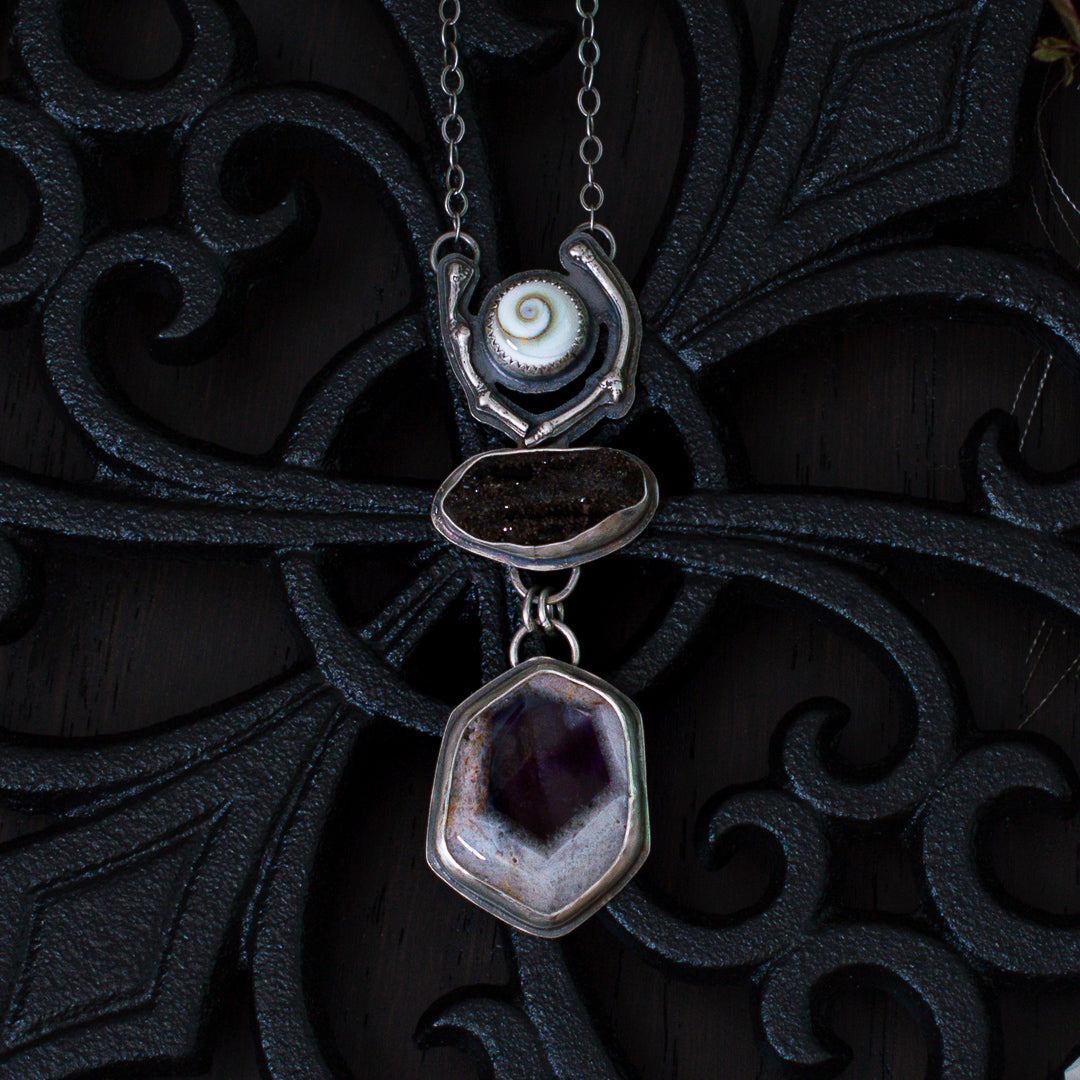 A 3 stone talisman ritual necklace with a sterling silver cast branch.