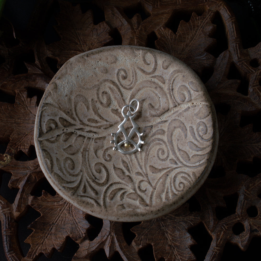 Rising Consciousness Charm