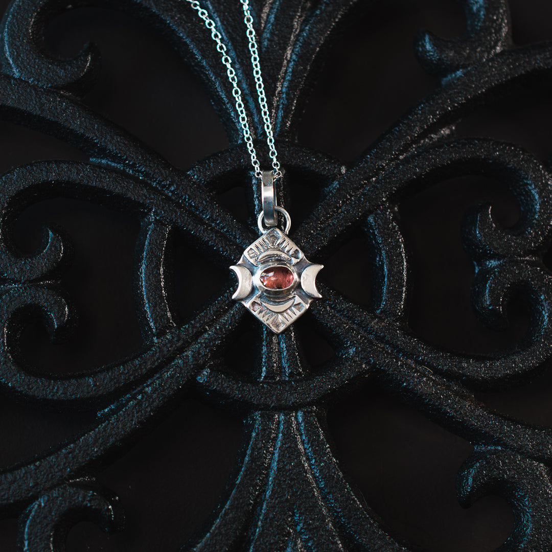 
                  
                    Crescent Portal Charm: Rose Glow
                  
                